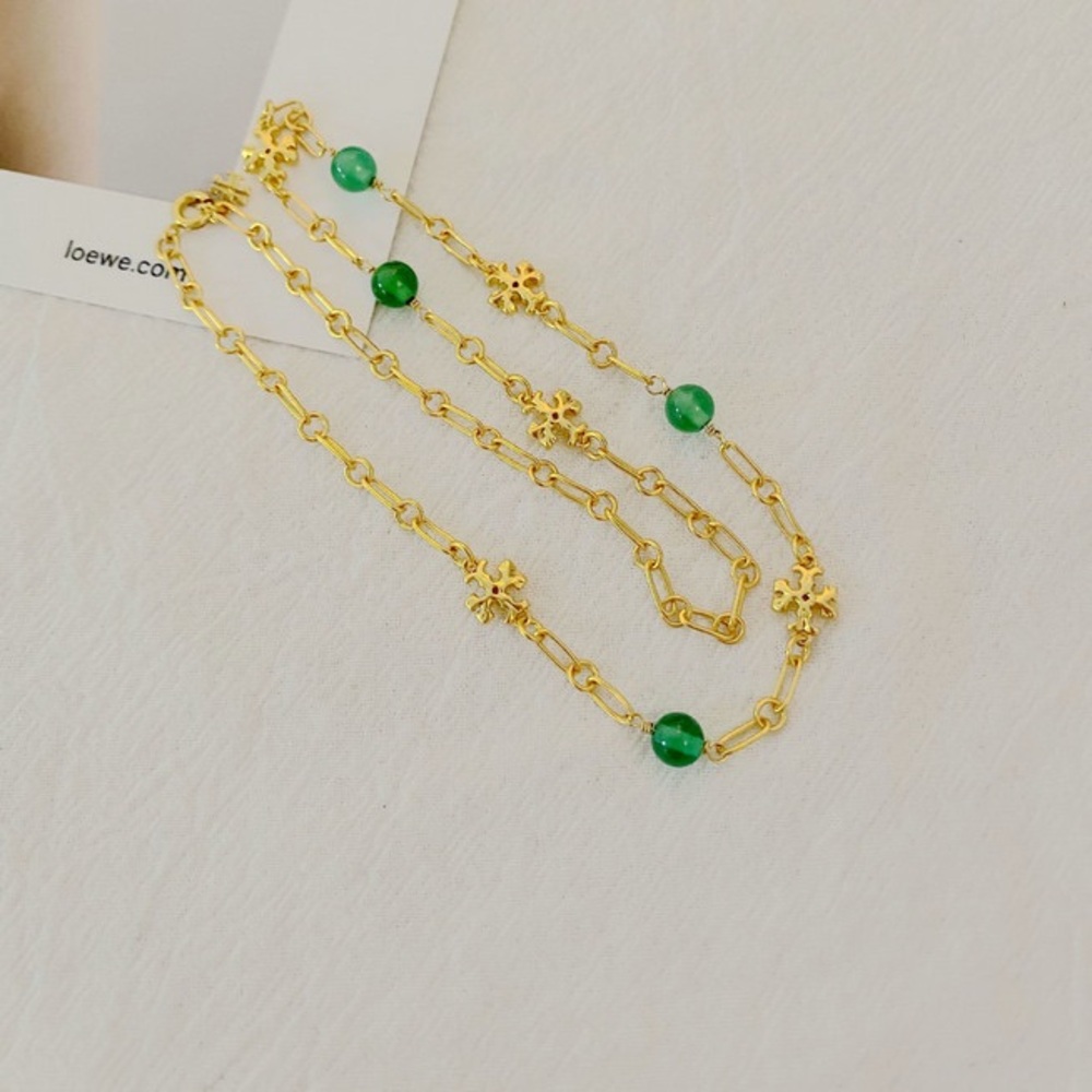Tory Burch Elegant Gold and Green Gemstone Necklace - Picture 3 of 15